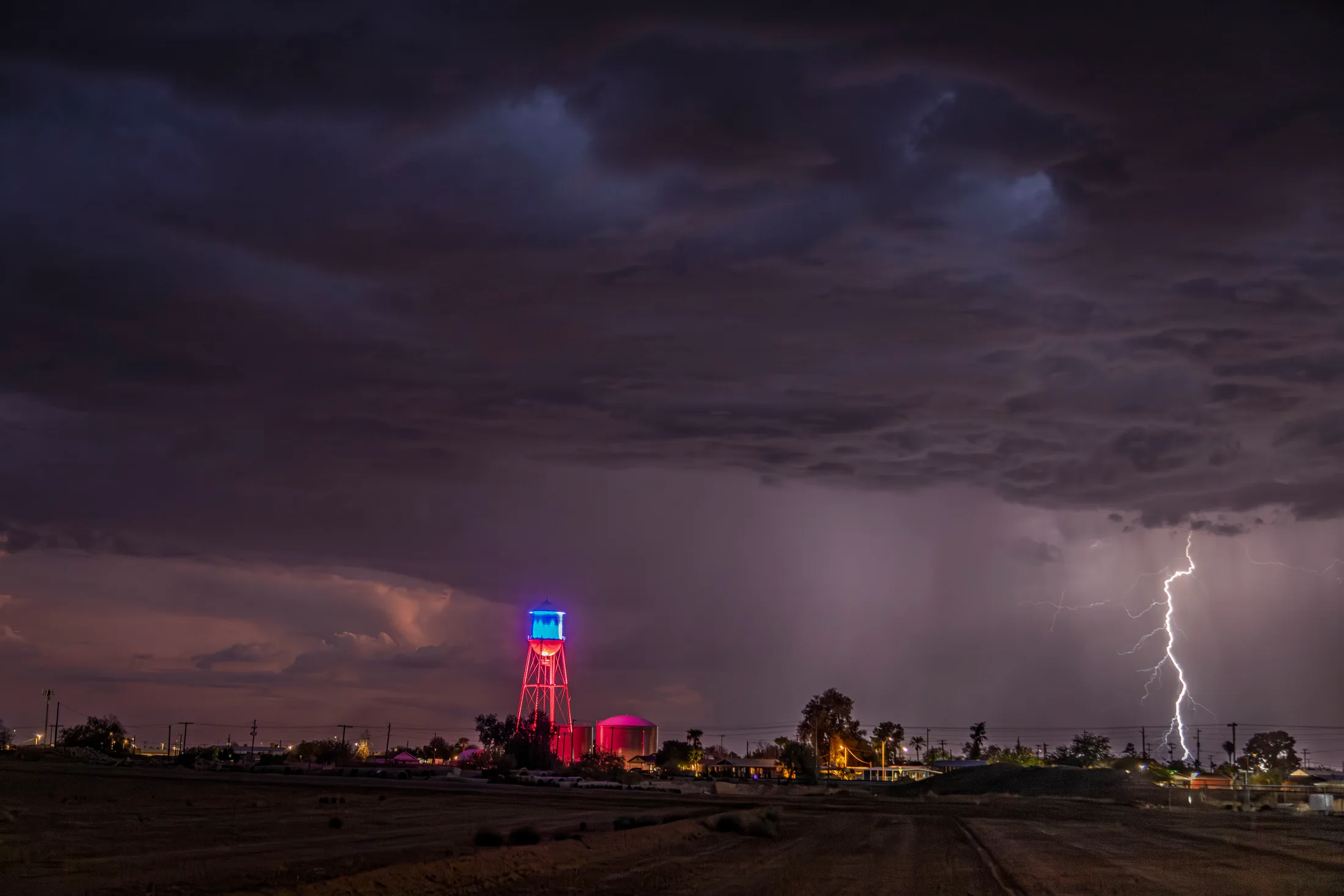 Coolidge Water Tower and Lightning, a fine art photograph by Michael Joseph Baca, Casa de Baca Studios, Florence, Arizona