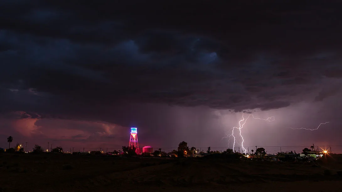 Coolidge Water Tower and Lightning, a fine art photograph by Janell Evelyn Baca, Casa de Baca Studios, Florence, Arizona