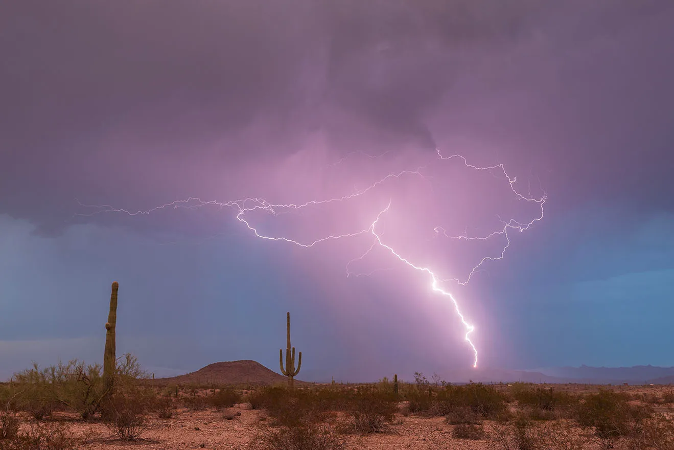 Downpour Hwy 79 just N of Florence, lightning, a fine art photograph by Janell Evelyn Baca