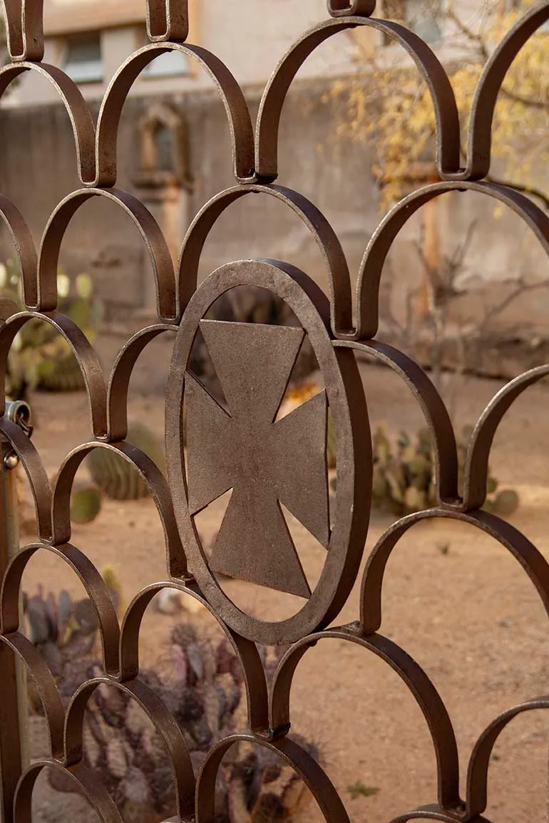 Iron Cross at San Xavier del Bac Mission, architecture, a fine art photograph by Janell Evelyn Baca