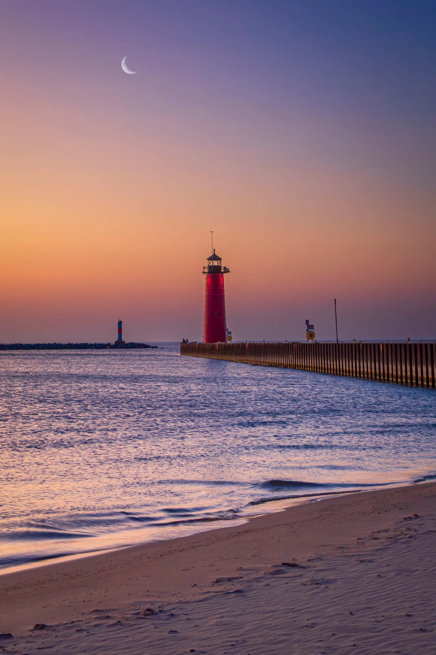 Kenosha Pier with Lighthouse and Moon Wisconsin, a fine art photograph by Michael Joseph Baca