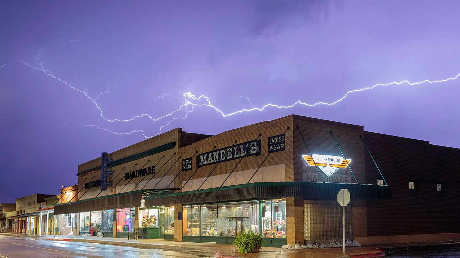 Monsoon on Main Florence AZ, lightning, a fine art photograph by Janell Evelyn Baca, Casa de Baca Studios, Florence, Arizona
