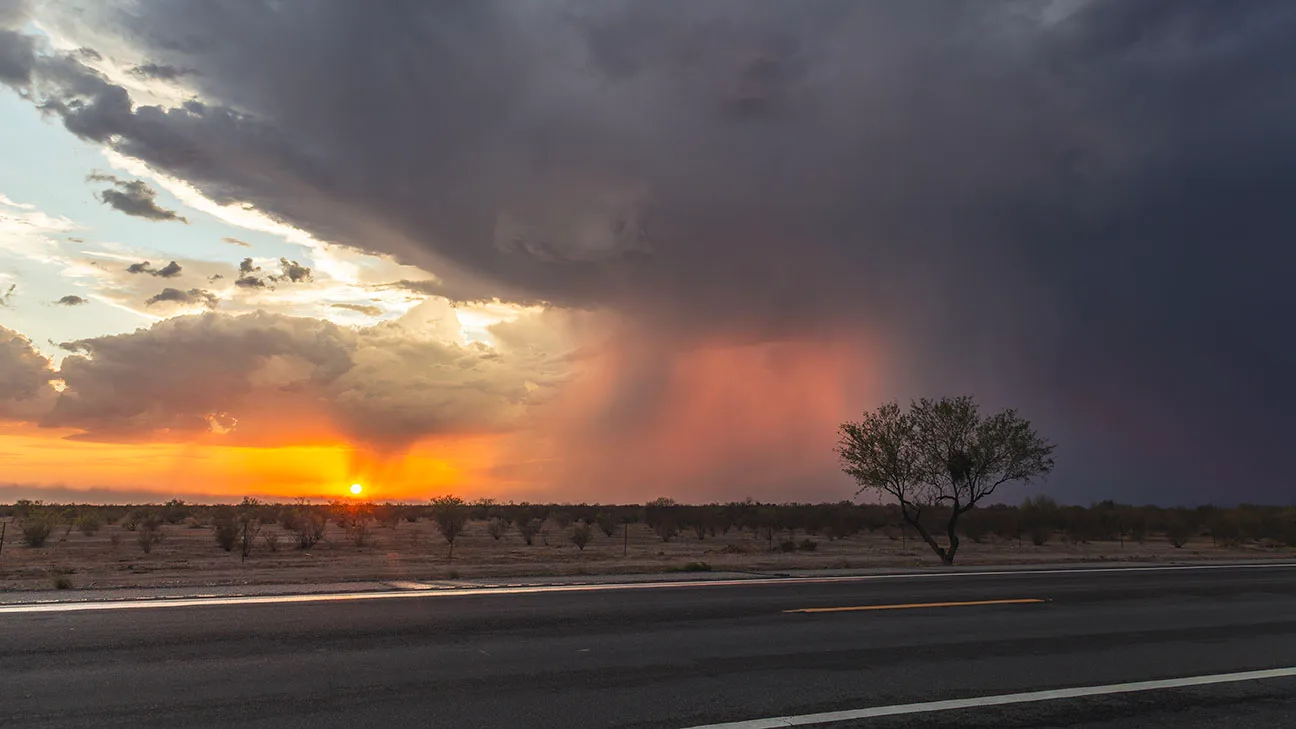 Monsoon Sunset off Hwy 60 near Peralta, a fine art photograph by Janell Evelyn Baca, Casa de Baca Studios, Florence, Arizona