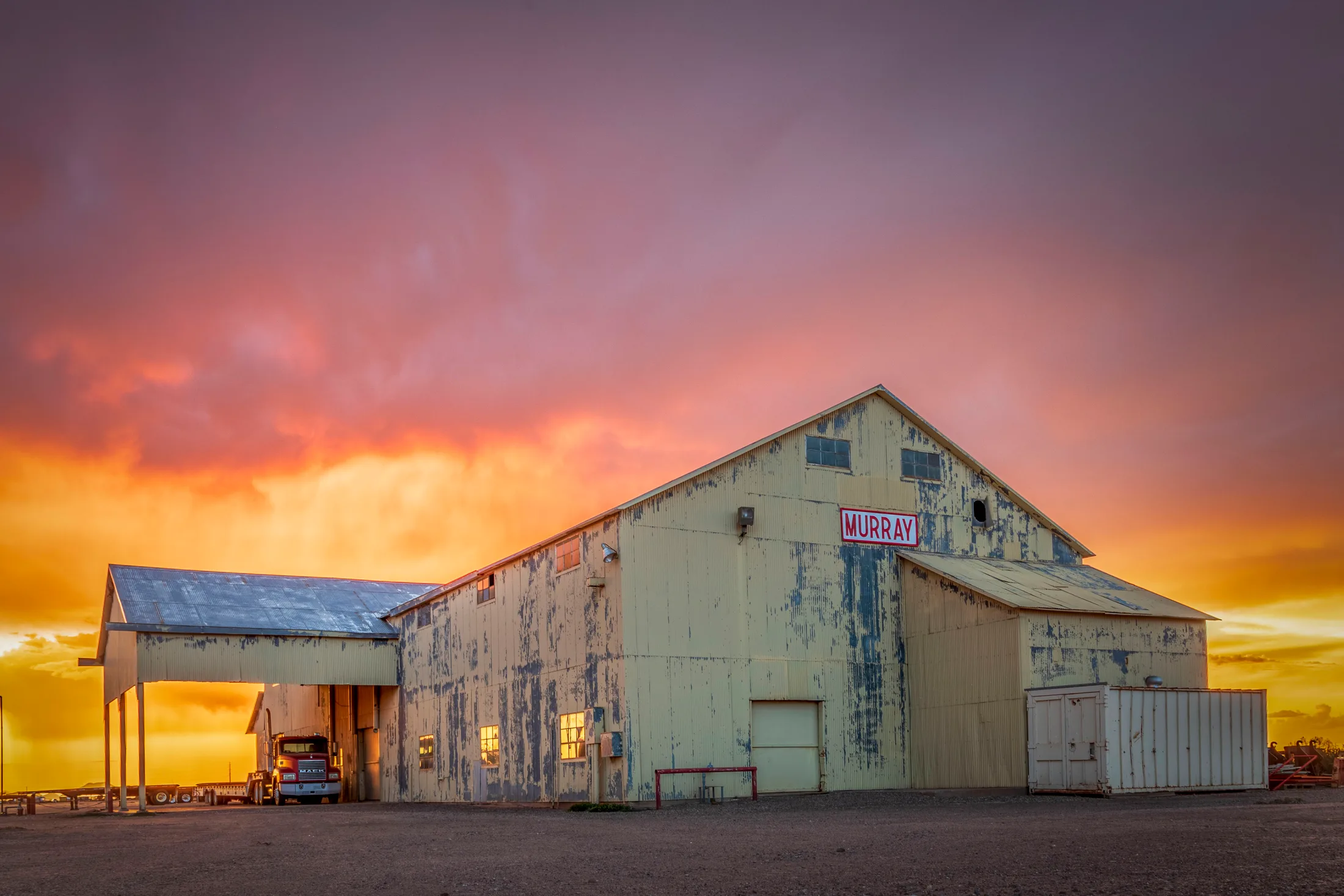Sunshine Road Sunset Coolidge AZ, architecture, a fine art photograph by Michael Joseph Baca