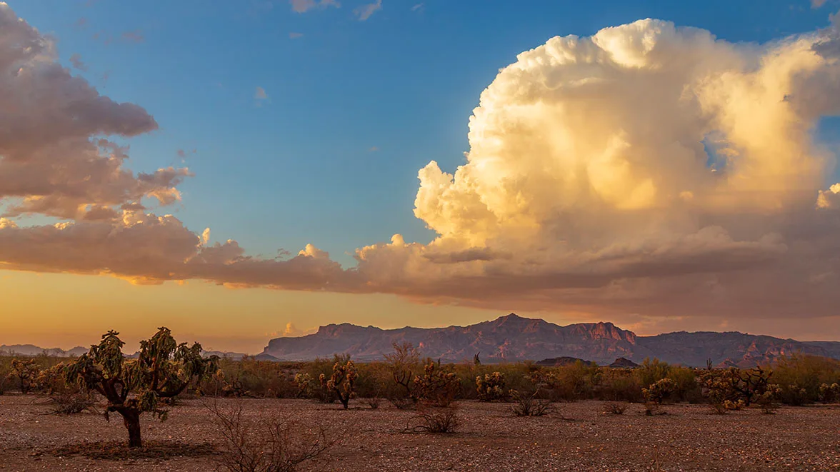 Superstition Mountains off the 60, sunset and sunrise, a fine art photograph by Janell Evelyn Baca