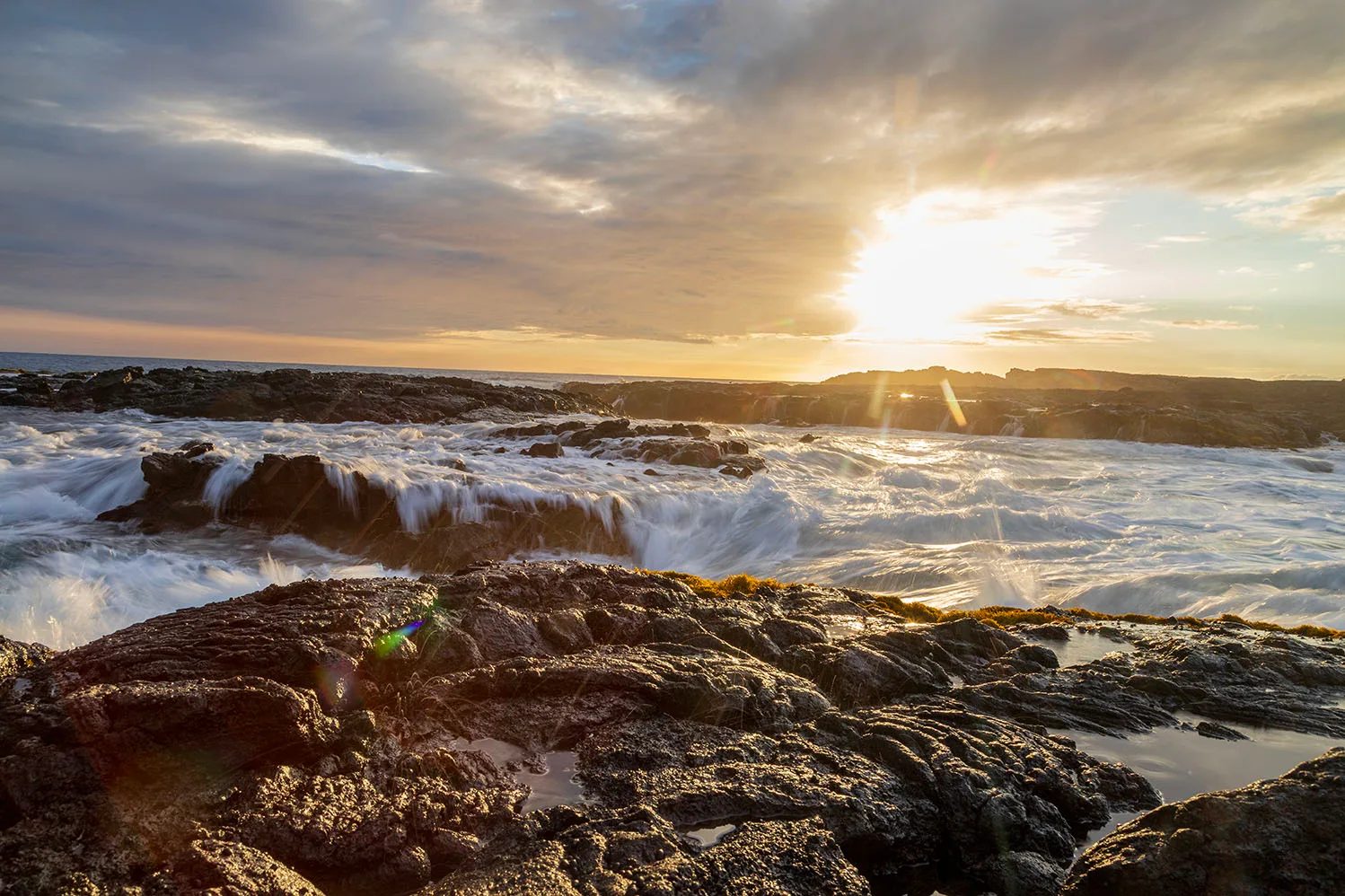 Wawaloli Beach Tide Pools Sunset, ocean and lake and river and pier, a fine art photograph by Janell Evelyn Baca